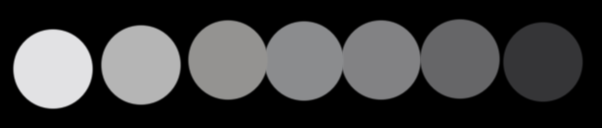 A set of seven grey dots, ranging from almost white to black.