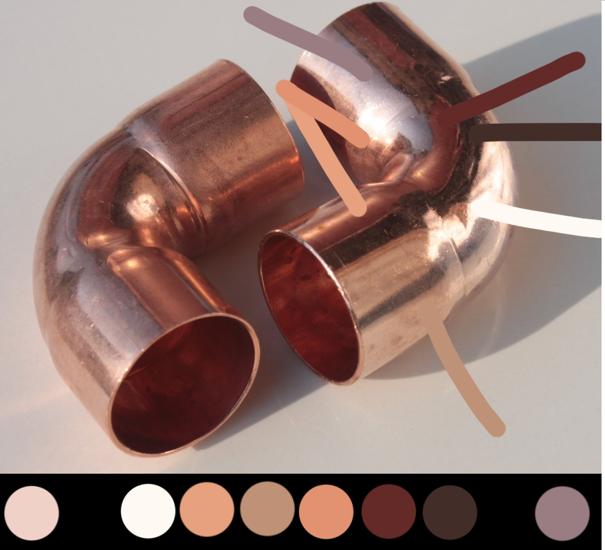 Two L shaped copper pipes, with their colors demonstrated in a line of dots beneath the main image.