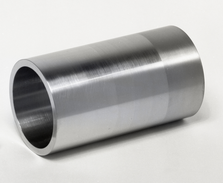 A metal cylinder, laying on its side.