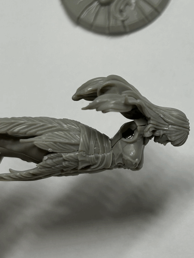 A close up of a partially assembled plastic model